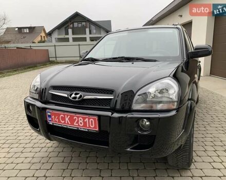 Черный Хендай Туксон, объемом двигателя 2 л и пробегом 114 тыс. км за 8850 $, фото 2 на Automoto.ua