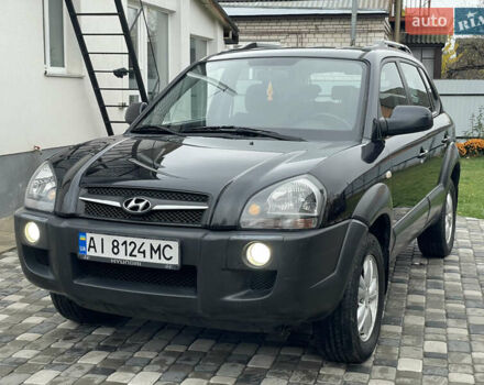 Чорний Хендай Туксон, об'ємом двигуна 2 л та пробігом 200 тис. км за 8450 $, фото 11 на Automoto.ua