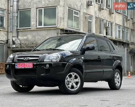 Черный Хендай Туксон, объемом двигателя 1.98 л и пробегом 116 тыс. км за 9599 $, фото 1 на Automoto.ua