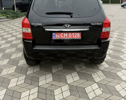 Черный Хендай Туксон, объемом двигателя 2 л и пробегом 191 тыс. км за 8500 $, фото 21 на Automoto.ua