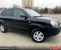 Черный Хендай Туксон, объемом двигателя 2 л и пробегом 168 тыс. км за 7700 $, фото 1 на Automoto.ua