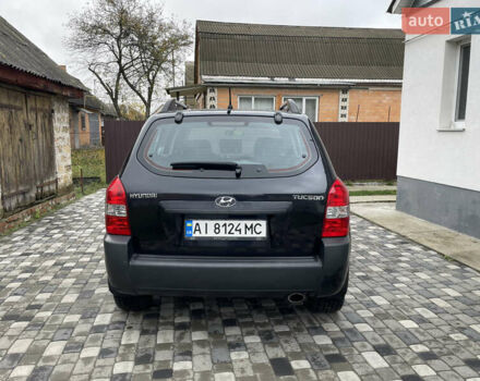 Чорний Хендай Туксон, об'ємом двигуна 2 л та пробігом 200 тис. км за 8450 $, фото 6 на Automoto.ua