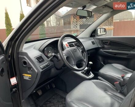 Черный Хендай Туксон, объемом двигателя 2 л и пробегом 114 тыс. км за 8850 $, фото 37 на Automoto.ua