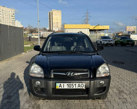 Черный Хендай Туксон, объемом двигателя 1.98 л и пробегом 220 тыс. км за 7500 $, фото 2 на Automoto.ua