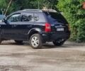 Чорний Хендай Туксон, об'ємом двигуна 2 л та пробігом 157 тис. км за 10000 $, фото 1 на Automoto.ua