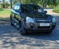 Черный Хендай Туксон, объемом двигателя 2 л и пробегом 236 тыс. км за 7400 $, фото 1 на Automoto.ua