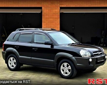 Черный Хендай Туксон, объемом двигателя 2 л и пробегом 91 тыс. км за 10999 $, фото 5 на Automoto.ua