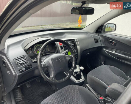 Чорний Хендай Туксон, об'ємом двигуна 2 л та пробігом 200 тис. км за 8450 $, фото 23 на Automoto.ua