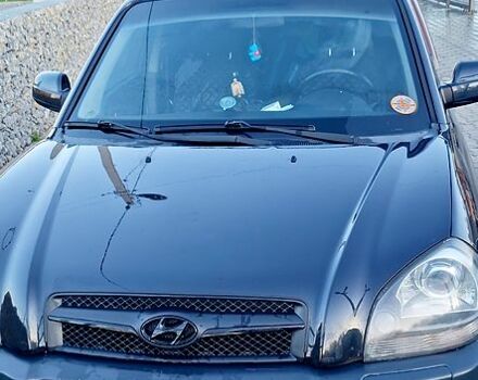 Черный Хендай Туксон, объемом двигателя 2 л и пробегом 240 тыс. км за 8700 $, фото 6 на Automoto.ua