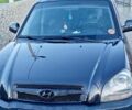 Черный Хендай Туксон, объемом двигателя 2 л и пробегом 240 тыс. км за 8700 $, фото 6 на Automoto.ua