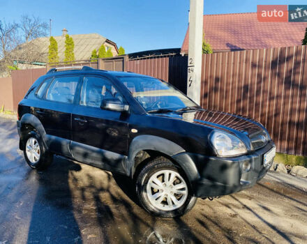 Черный Хендай Туксон, объемом двигателя 1.99 л и пробегом 95 тыс. км за 8500 $, фото 1 на Automoto.ua