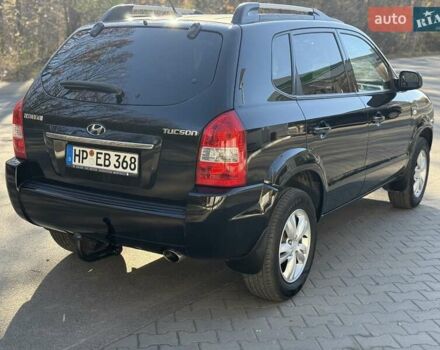 Черный Хендай Туксон, объемом двигателя 2 л и пробегом 148 тыс. км за 8700 $, фото 41 на Automoto.ua