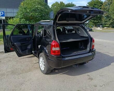 Чорний Хендай Туксон, об'ємом двигуна 1.98 л та пробігом 242 тис. км за 8900 $, фото 12 на Automoto.ua