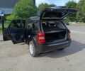 Чорний Хендай Туксон, об'ємом двигуна 1.98 л та пробігом 242 тис. км за 8900 $, фото 12 на Automoto.ua