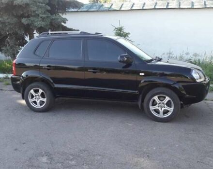 Черный Хендай Туксон, объемом двигателя 2 л и пробегом 220 тыс. км за 7500 $, фото 3 на Automoto.ua