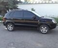 Черный Хендай Туксон, объемом двигателя 2 л и пробегом 220 тыс. км за 7500 $, фото 3 на Automoto.ua