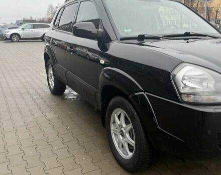 Черный Хендай Туксон, объемом двигателя 2 л и пробегом 237 тыс. км за 8350 $, фото 15 на Automoto.ua