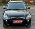 Черный Хендай Туксон, объемом двигателя 2 л и пробегом 110 тыс. км за 8899 $, фото 13 на Automoto.ua