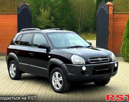 Черный Хендай Туксон, объемом двигателя 2 л и пробегом 91 тыс. км за 10999 $, фото 3 на Automoto.ua