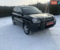 Черный Хендай Туксон, объемом двигателя 2 л и пробегом 135 тыс. км за 9000 $, фото 1 на Automoto.ua