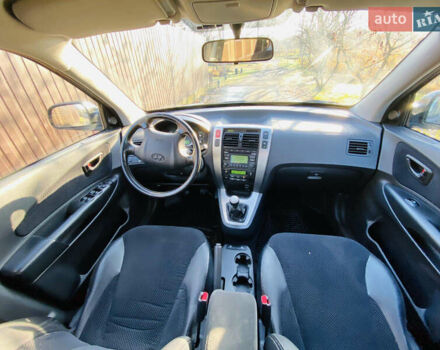 Черный Хендай Туксон, объемом двигателя 1.99 л и пробегом 95 тыс. км за 8500 $, фото 19 на Automoto.ua