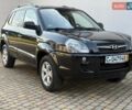 Черный Хендай Туксон, объемом двигателя 1.98 л и пробегом 165 тыс. км за 8500 $, фото 1 на Automoto.ua