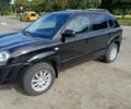 Чорний Хендай Туксон, об'ємом двигуна 1.98 л та пробігом 242 тис. км за 8900 $, фото 1 на Automoto.ua