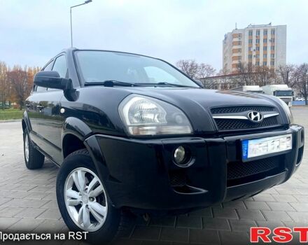 Черный Хендай Туксон, объемом двигателя 2 л и пробегом 168 тыс. км за 7700 $, фото 3 на Automoto.ua