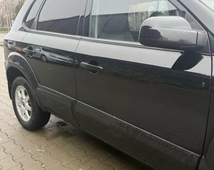 Черный Хендай Туксон, объемом двигателя 2 л и пробегом 237 тыс. км за 8350 $, фото 16 на Automoto.ua