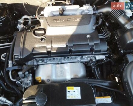 Черный Хендай Туксон, объемом двигателя 1.99 л и пробегом 159 тыс. км за 9700 $, фото 7 на Automoto.ua