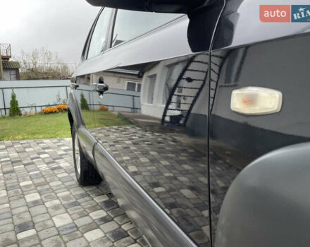 Чорний Хендай Туксон, об'ємом двигуна 2 л та пробігом 200 тис. км за 8450 $, фото 20 на Automoto.ua