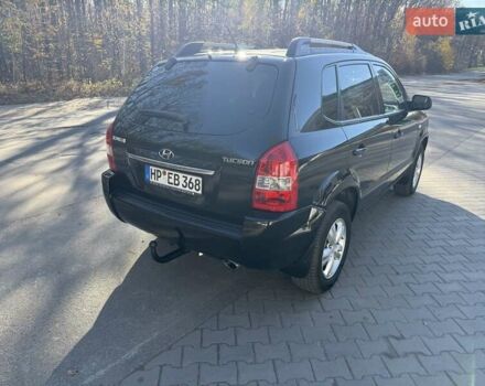 Черный Хендай Туксон, объемом двигателя 2 л и пробегом 148 тыс. км за 8700 $, фото 34 на Automoto.ua
