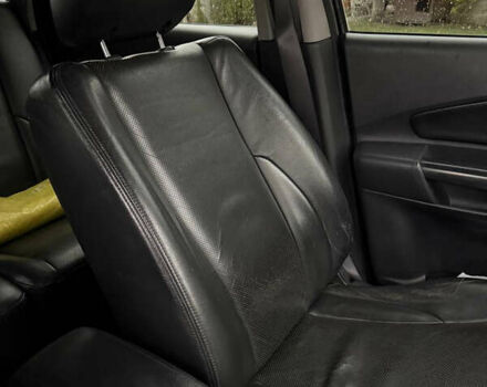 Черный Хендай Туксон, объемом двигателя 2.66 л и пробегом 205 тыс. км за 10000 $, фото 70 на Automoto.ua