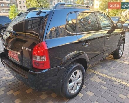 Черный Хендай Туксон, объемом двигателя 2 л и пробегом 135 тыс. км за 9750 $, фото 4 на Automoto.ua