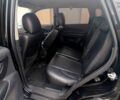 Чорний Хендай Туксон, об'ємом двигуна 2 л та пробігом 191 тис. км за 8900 $, фото 4 на Automoto.ua