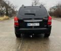 Черный Хендай Туксон, объемом двигателя 2 л и пробегом 128 тыс. км за 9200 $, фото 5 на Automoto.ua