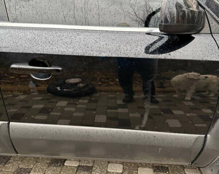 Черный Хендай Туксон, объемом двигателя 2.66 л и пробегом 205 тыс. км за 10000 $, фото 59 на Automoto.ua