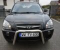 Черный Хендай Туксон, объемом двигателя 2 л и пробегом 184 тыс. км за 5480 $, фото 6 на Automoto.ua