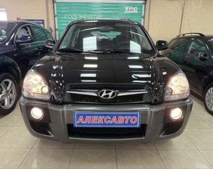 Черный Хендай Туксон, объемом двигателя 2 л и пробегом 160 тыс. км за 8300 $, фото 1 на Automoto.ua