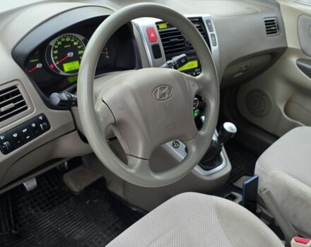 Черный Хендай Туксон, объемом двигателя 2 л и пробегом 198 тыс. км за 7999 $, фото 3 на Automoto.ua