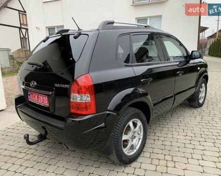 Черный Хендай Туксон, объемом двигателя 2 л и пробегом 114 тыс. км за 8850 $, фото 8 на Automoto.ua