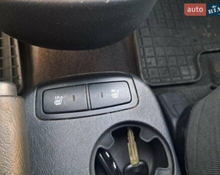 Черный Хендай Туксон, объемом двигателя 1.98 л и пробегом 233 тыс. км за 7850 $, фото 16 на Automoto.ua