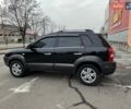 Черный Хендай Туксон, объемом двигателя 2 л и пробегом 282 тыс. км за 8700 $, фото 10 на Automoto.ua