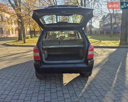 Чорний Хендай Туксон, об'ємом двигуна 2 л та пробігом 187 тис. км за 7900 $, фото 4 на Automoto.ua