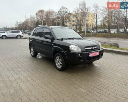 Черный Хендай Туксон, объемом двигателя 2 л и пробегом 237 тыс. км за 8350 $, фото 13 на Automoto.ua