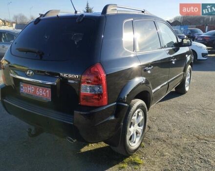Черный Хендай Туксон, объемом двигателя 1.99 л и пробегом 159 тыс. км за 9700 $, фото 27 на Automoto.ua
