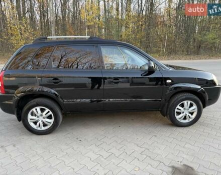 Черный Хендай Туксон, объемом двигателя 2 л и пробегом 148 тыс. км за 8700 $, фото 9 на Automoto.ua