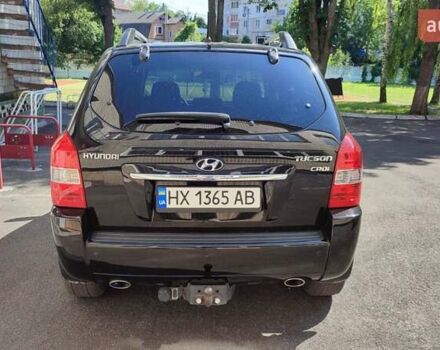 Чорний Хендай Туксон, об'ємом двигуна 2 л та пробігом 157 тис. км за 10000 $, фото 2 на Automoto.ua