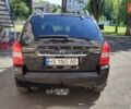 Чорний Хендай Туксон, об'ємом двигуна 2 л та пробігом 157 тис. км за 10000 $, фото 2 на Automoto.ua