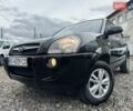 Чорний Хендай Туксон, об'ємом двигуна 2 л та пробігом 166 тис. км за 7500 $, фото 1 на Automoto.ua